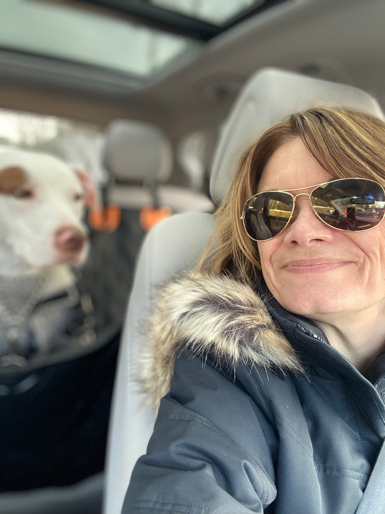 Becky and Remy making a post office delivery in Baltimore.
