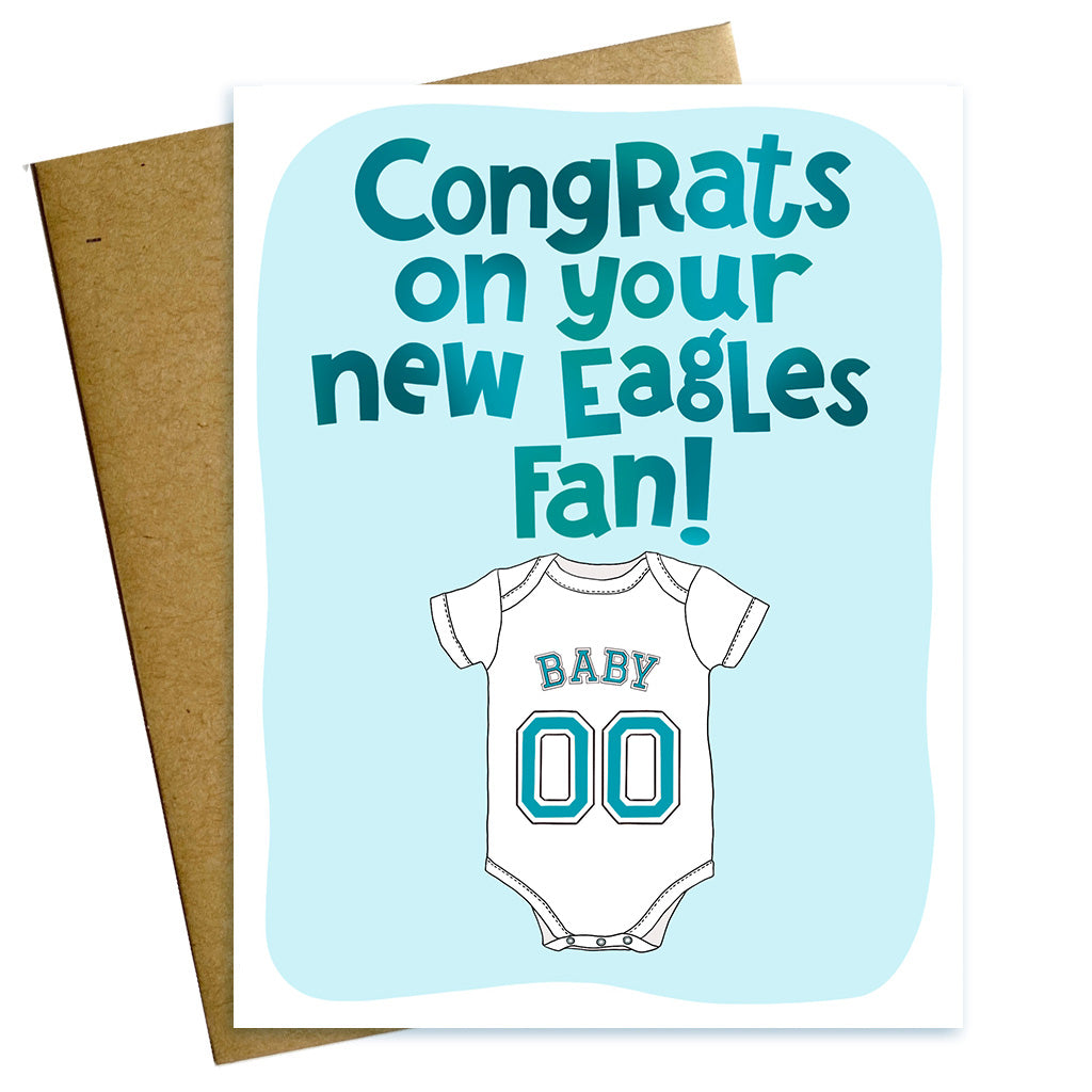 Hand lettered new baby shower card reading congrats on your new Eagles fan with a Baby onesie in Philadelphia Eagles green. 